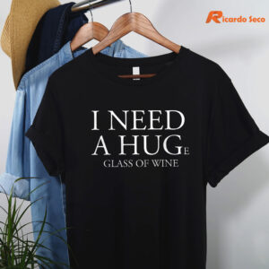 i-need-a-huge-glass-of-wine-funny-t-shirt-hanging-on-the-hanger.jpg