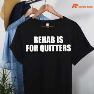 rehab-is-for-quitters-t-shirt-hanging-on-the-hanger.jpg